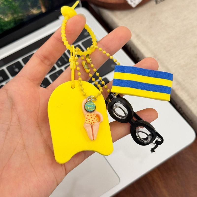 (N) พวงกุญแจธีมว่ายน้ำพร้อมแว่ - Swimming Kickboard บทวิจารณ์และราคา